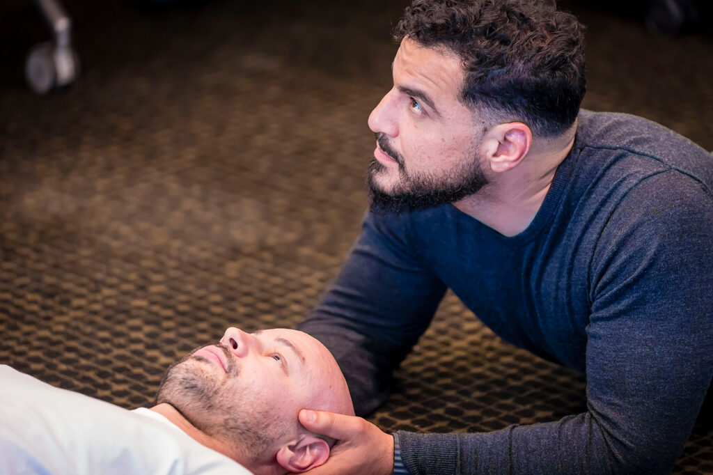 Dr Jomaa assessing a patient